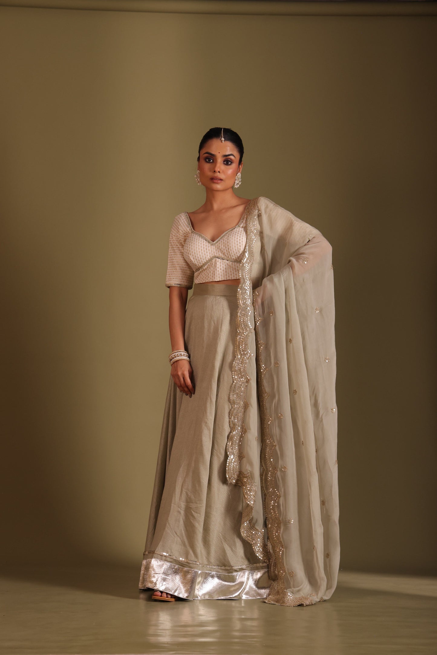 Noorika Ivory Brocade Blouse with Sage Silk Lehenga and dupatta- set of 3