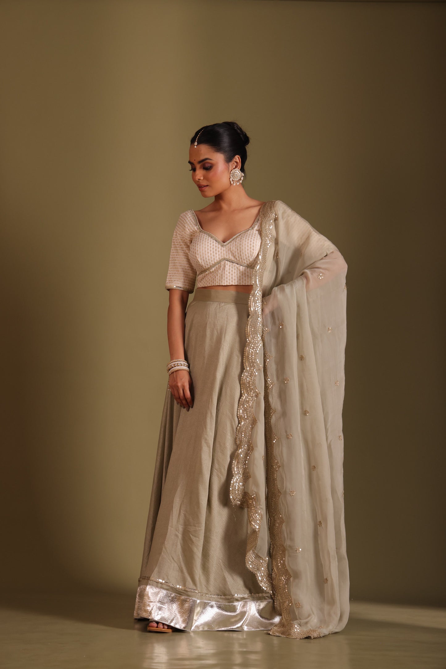 Noorika Ivory Brocade Blouse with Sage Silk Lehenga and dupatta- set of 3