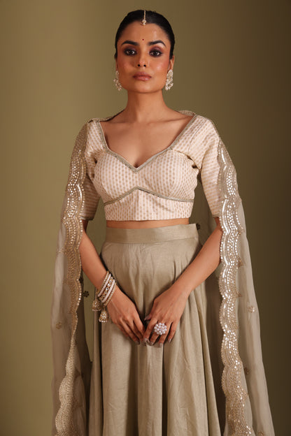 Noorika Ivory Brocade Blouse with Sage Silk Lehenga and dupatta- set of 3